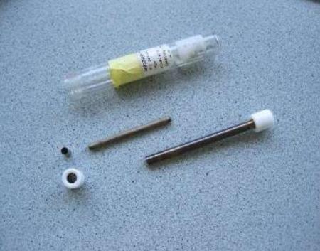 Een A/K sampler in een glazen transportkoker @VMM
